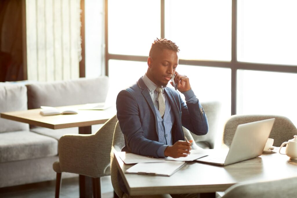 Business man working and answering a call